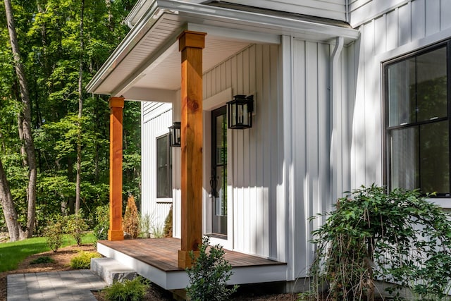 view of exterior entry with a porch