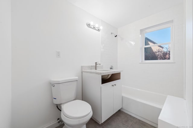 full bathroom with tile patterned flooring, vanity, toilet, and tiled shower / bath combo