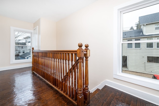 staircase featuring hardwood / wood-style floors