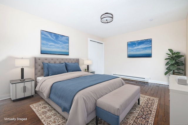 bedroom featuring a baseboard radiator and dark hardwood / wood-style flooring