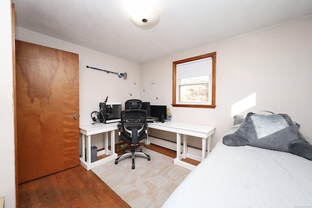 bedroom featuring hardwood / wood-style flooring