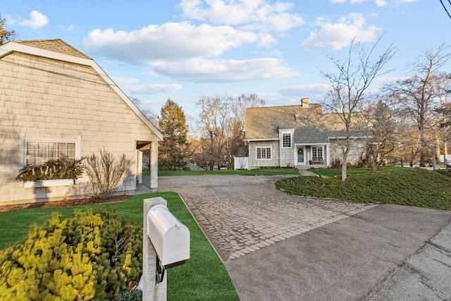 exterior space with decorative driveway