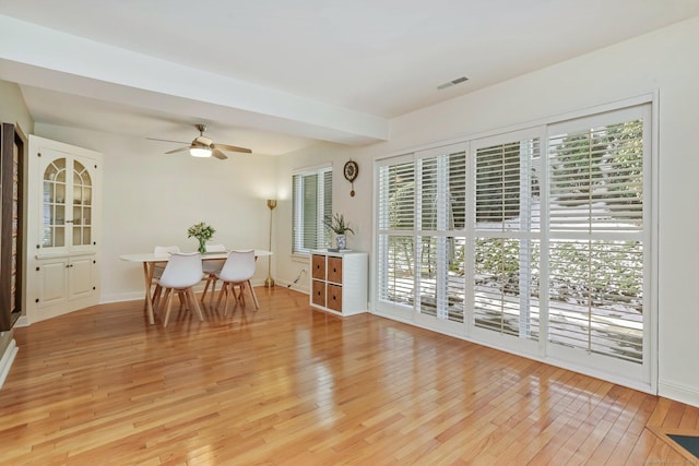 dining space featuring ceiling fan and light hardwood / wood-style floors