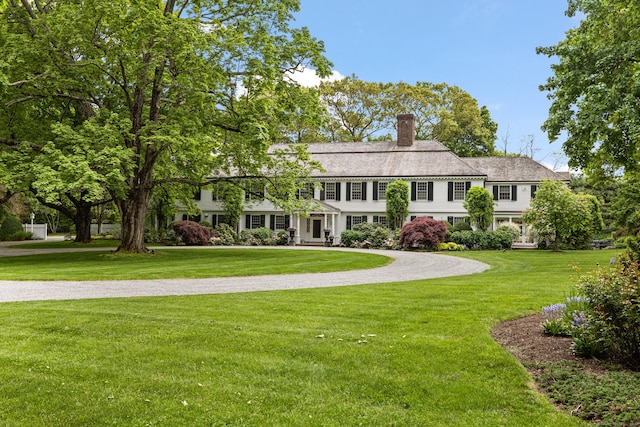 view of front of home with a front yard