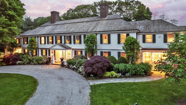 colonial house with a yard