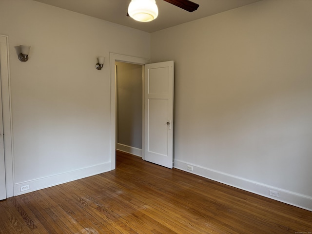 empty room with wood-type flooring