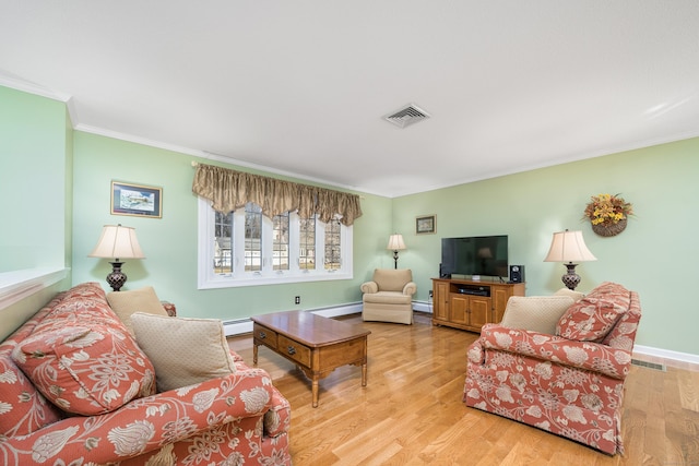 living room featuring crown molding, light wood-type flooring, and baseboard heating