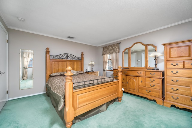 carpeted bedroom with crown molding