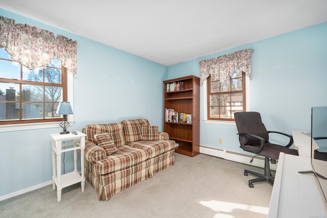 carpeted office space with a baseboard radiator