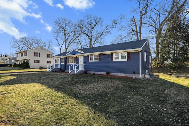 view of front of home featuring a front lawn