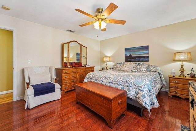 bedroom featuring dark wood-type flooring and ceiling fan