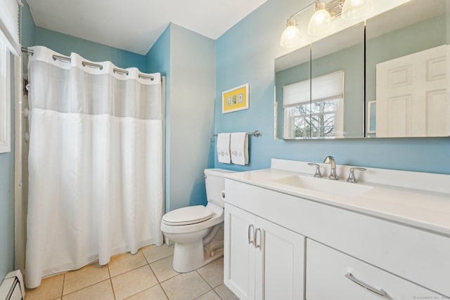 bathroom featuring tile patterned flooring, a baseboard heating unit, vanity, and toilet