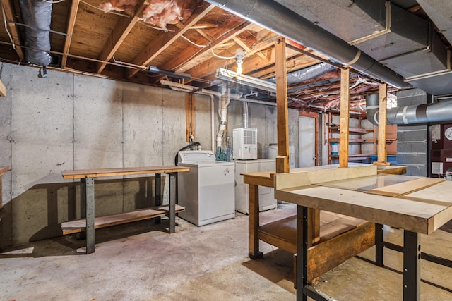 basement with washer and clothes dryer