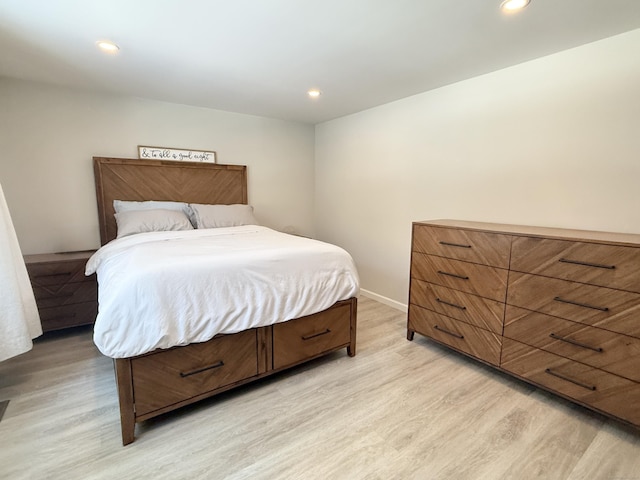 bedroom featuring light hardwood / wood-style flooring