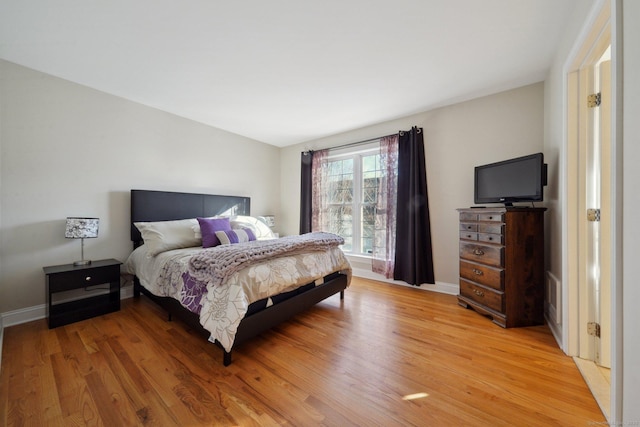 bedroom featuring light wood-type flooring