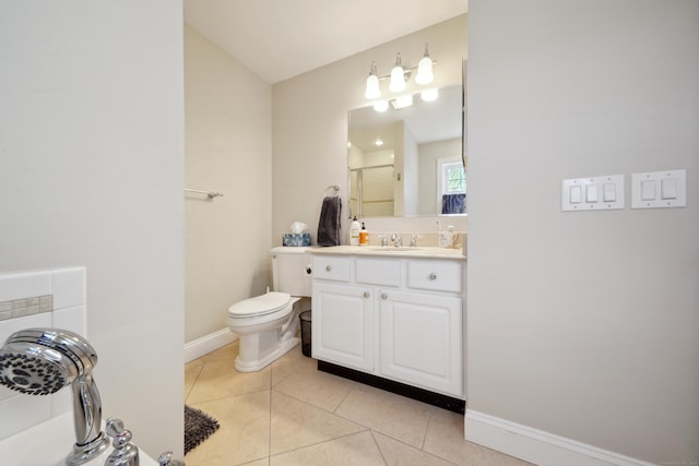 bathroom featuring vanity, tile patterned flooring, toilet, and a shower with shower door