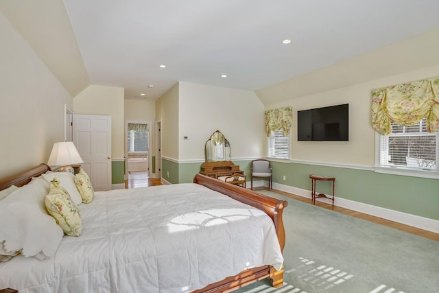 bedroom featuring vaulted ceiling, recessed lighting, wood finished floors, and baseboards