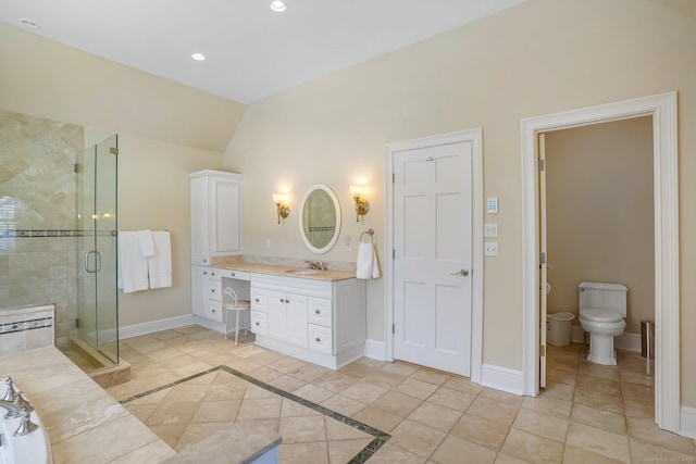 full bathroom featuring recessed lighting, lofted ceiling, a stall shower, vanity, and baseboards