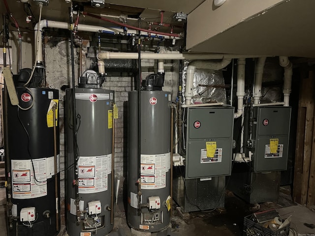 utility room featuring water heater