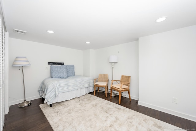 bedroom featuring dark hardwood / wood-style floors