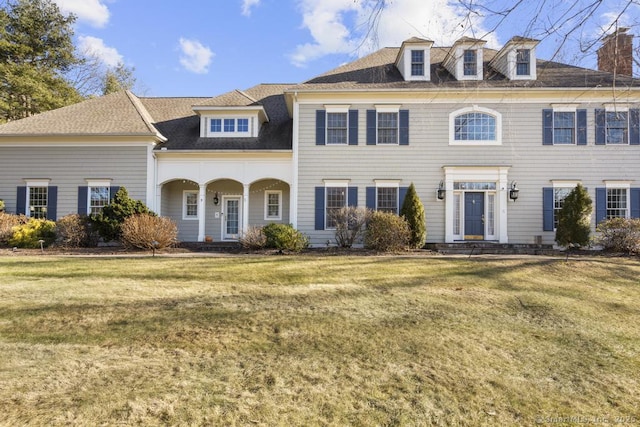 view of front of house with a front lawn