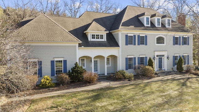 view of front of home with a front lawn