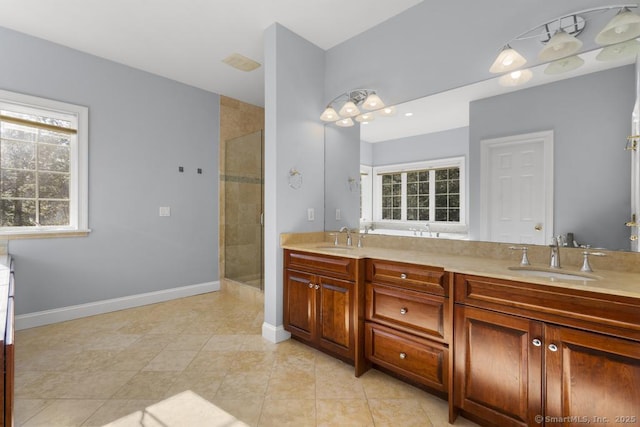 bathroom featuring walk in shower, tile patterned floors, and vanity