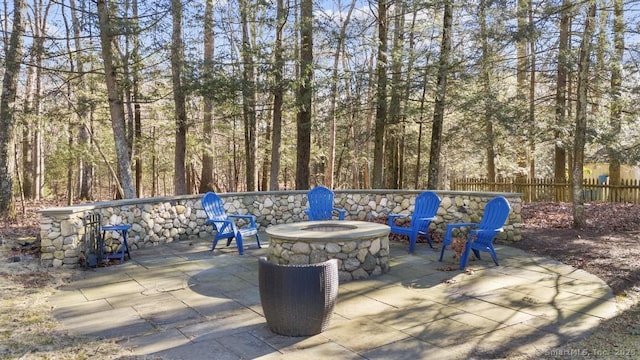 view of patio / terrace with a fire pit