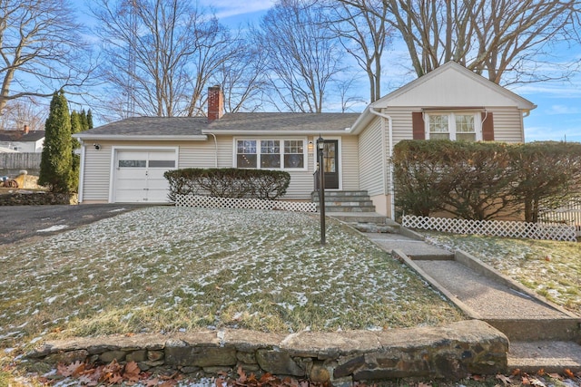 single story home with a garage