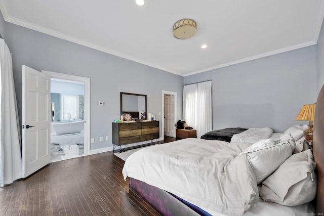 bedroom featuring connected bathroom, dark hardwood / wood-style floors, and crown molding