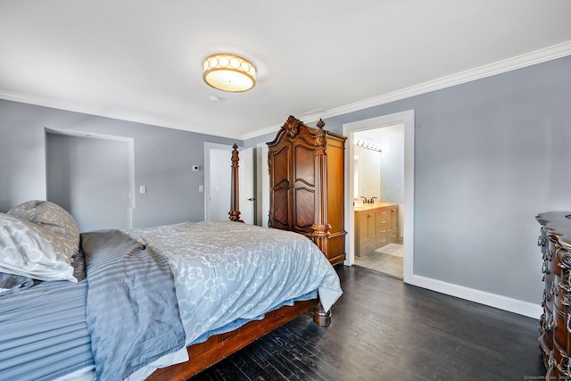 bedroom with ensuite bathroom, crown molding, and dark wood-type flooring