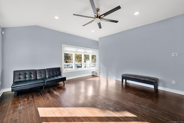 sitting room featuring ceiling fan, dark wood-type flooring, and vaulted ceiling