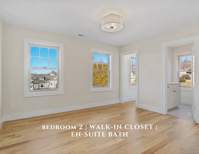 spare room featuring hardwood / wood-style floors