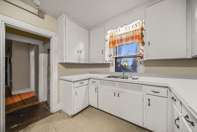 kitchen with white cabinets and sink