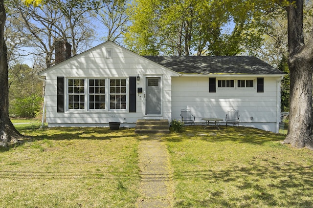72 Park Ave, Montville, CT 06382 - view of front of house featuring entry steps, a chimney, and a front yard