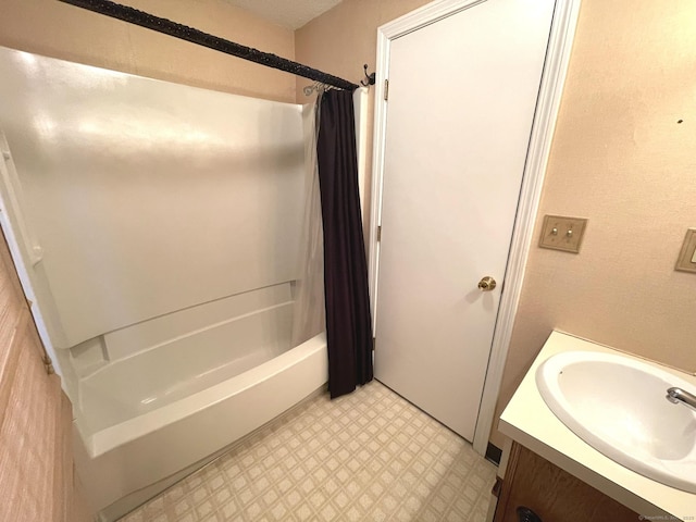 bathroom with vanity and shower / bathtub combination with curtain