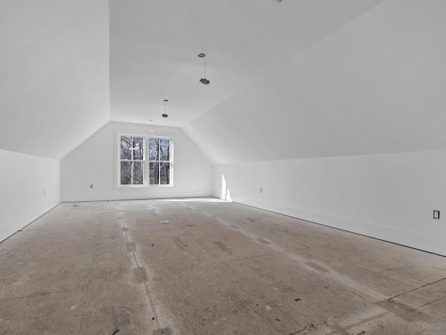 bonus room featuring lofted ceiling