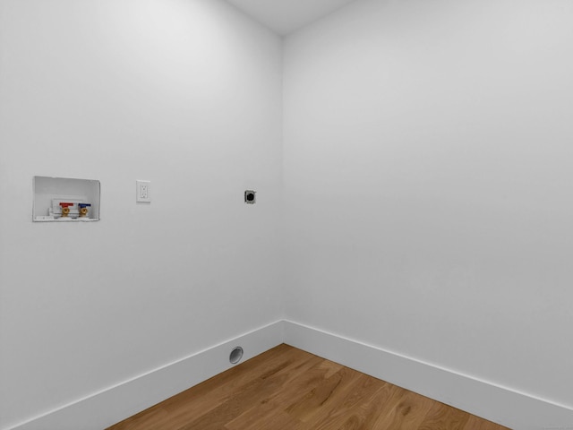 laundry room featuring wood-type flooring, hookup for an electric dryer, and washer hookup