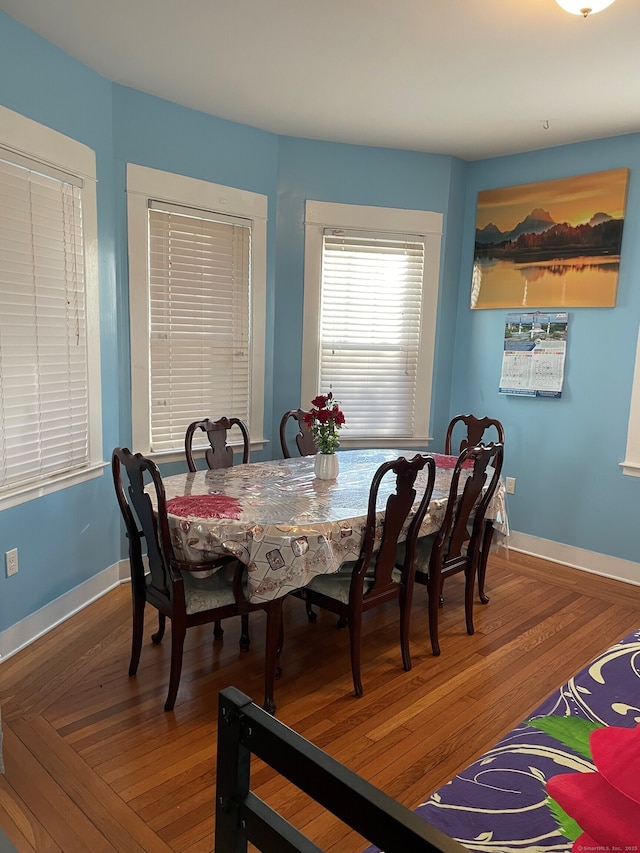 dining area featuring hardwood / wood-style floors