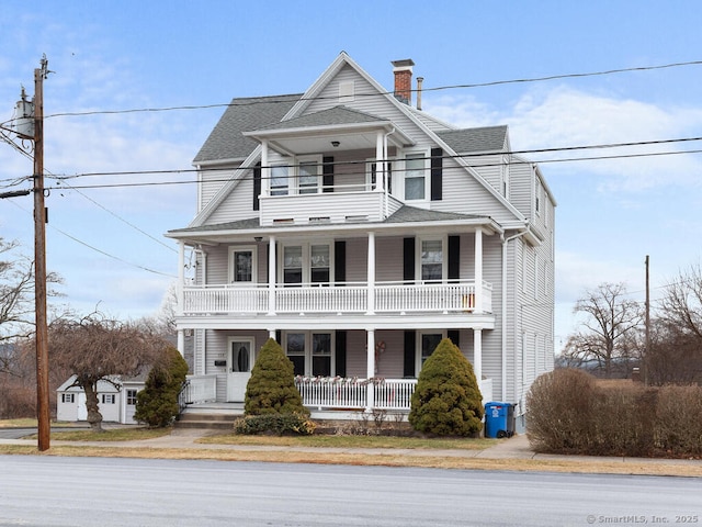 view of front of home featuring a balcony and a porch