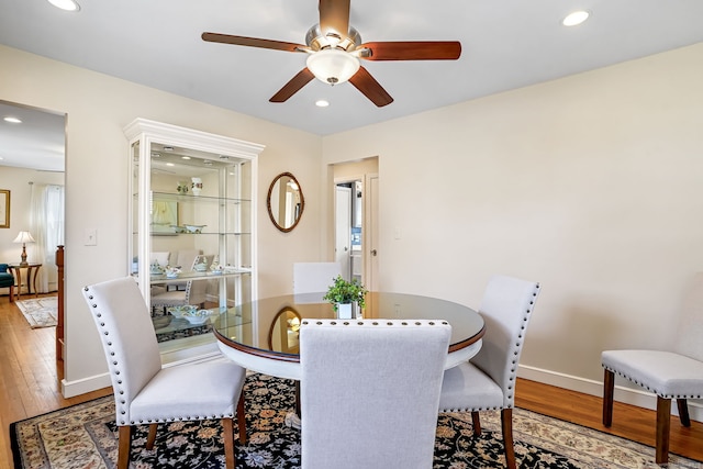 dining space with recessed lighting, baseboards, ceiling fan, and hardwood / wood-style flooring