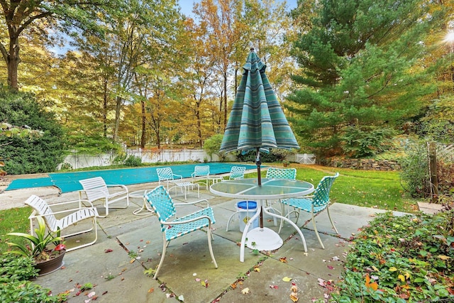 view of patio / terrace with a covered pool