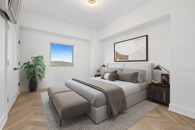 bedroom featuring light parquet floors