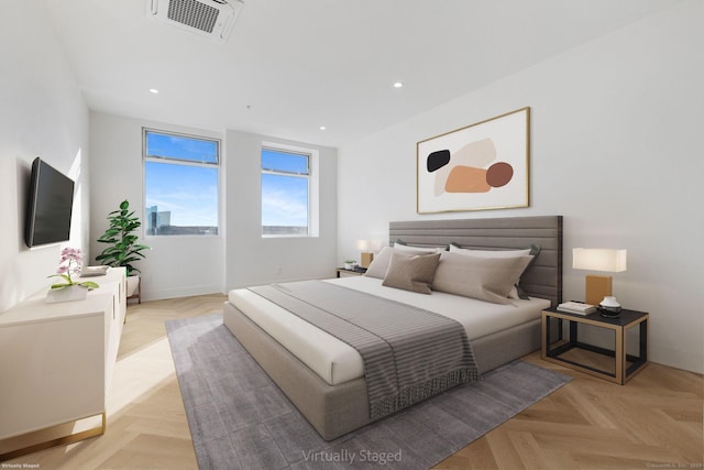 bedroom featuring light parquet floors