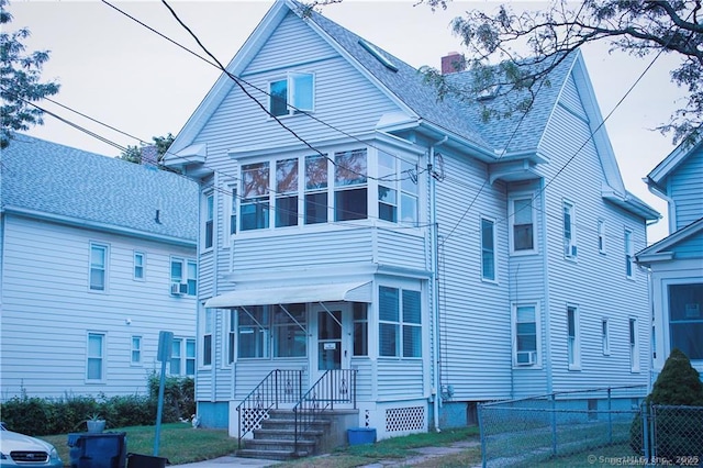 view of front of house with cooling unit