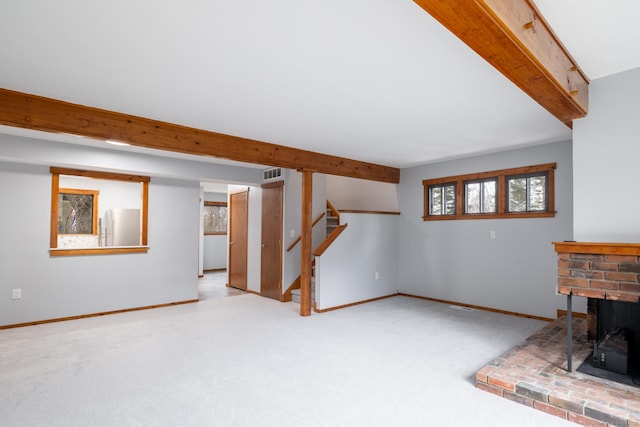 unfurnished living room with light carpet