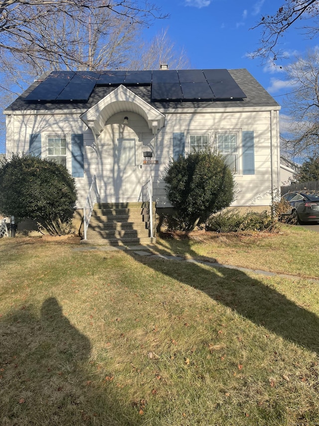 view of front facade with a front lawn