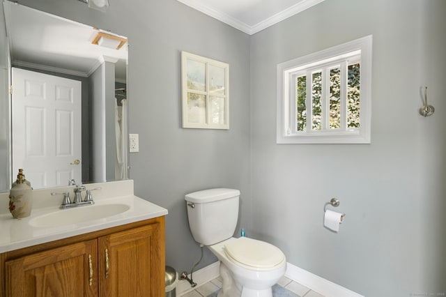 bathroom featuring tile patterned flooring, vanity, toilet, and ornamental molding