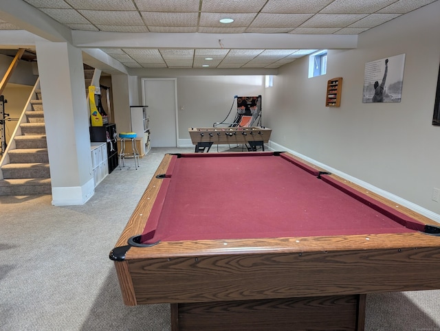 game room with a drop ceiling, carpet flooring, and baseboards