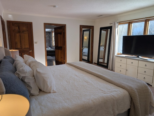 bedroom with visible vents, a textured ceiling, and crown molding